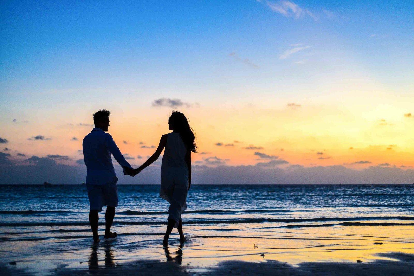 7 Inspiring Insights on Common Obsessions in R-OCD a man and woman holding hands on a beach: 7 Inspiring Insights on Common Obsessions in R-OCD